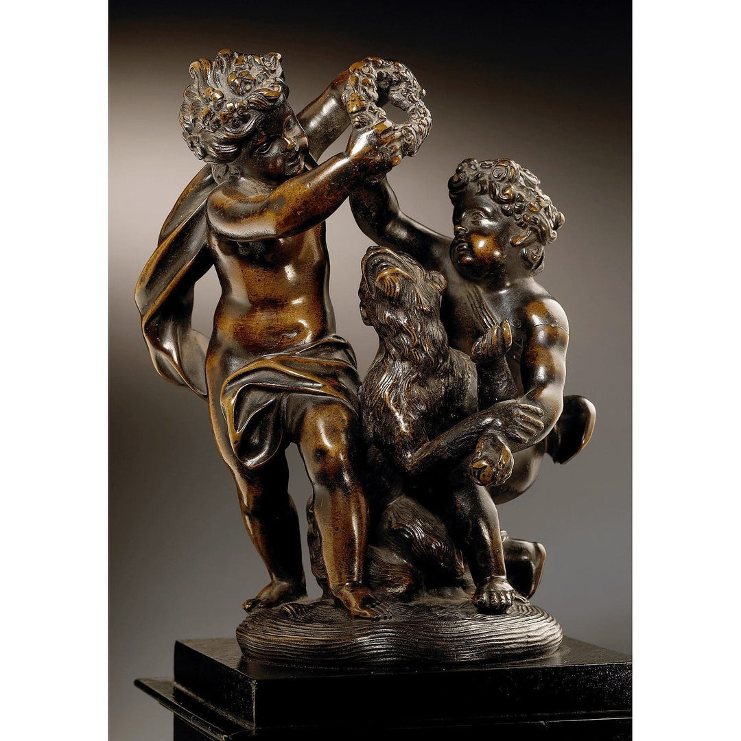 Pair of bronze cherub groups with playful cherubs and animals on detailed bases, inspired by German garden sculptures.
