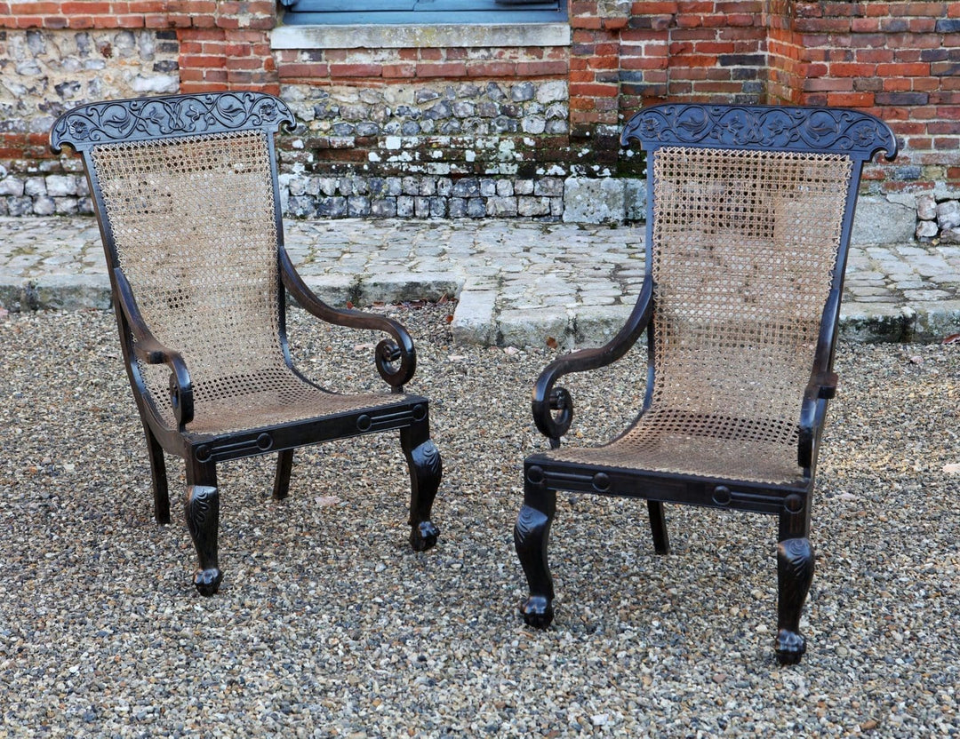 Pair of 19th Century Anglo Indian Solid Ebony Caned Armchairs