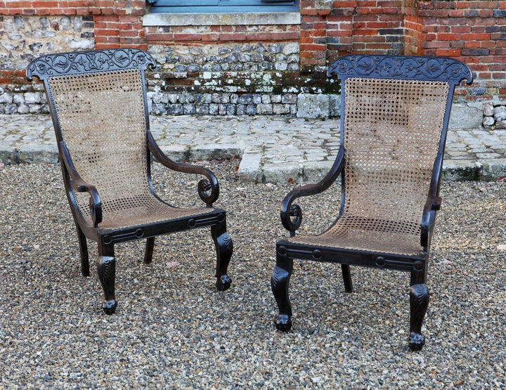 Pair of 19th Century Anglo Indian Solid Ebony Caned Armchairs