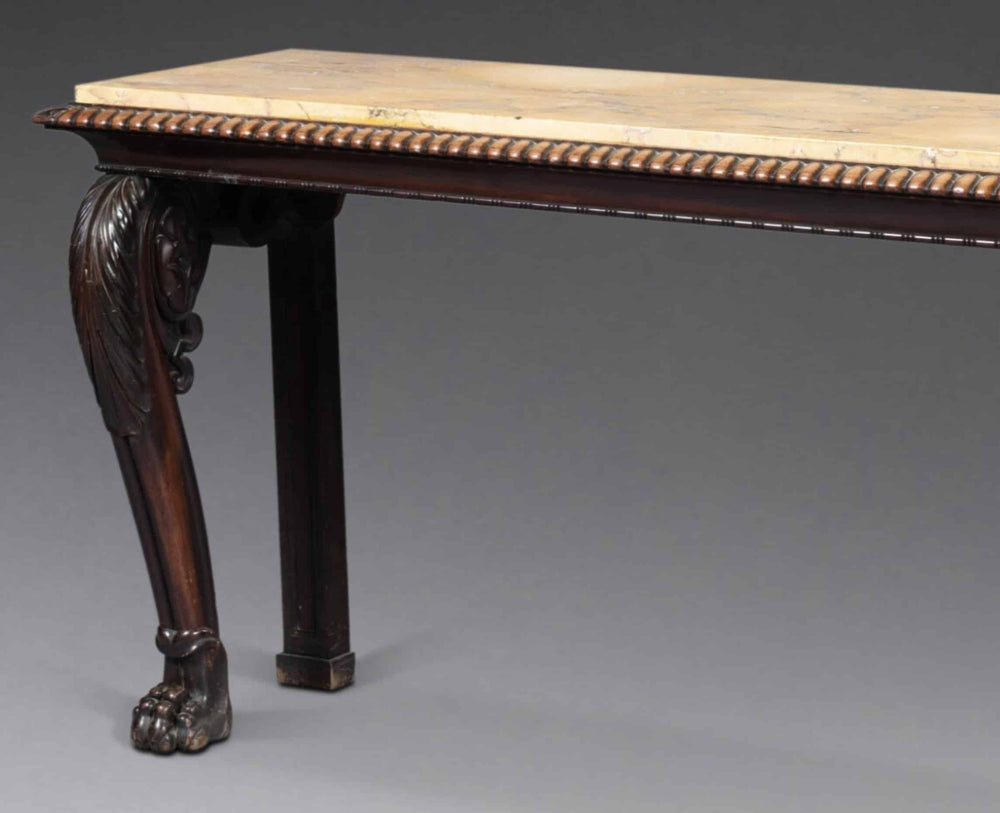 Regency Console Table in The Manner of Thomas Hope with mahogany zoomorphic legs and yellow Siena marble top circa 1820.