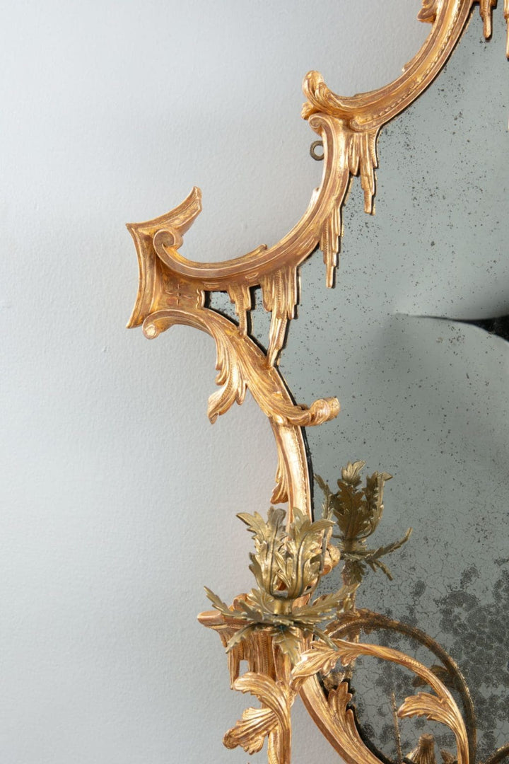 George III Chinese Chippendale Rococo Giltwood Girandole Mirror with ornate gilded C and S scrolls and candle arms