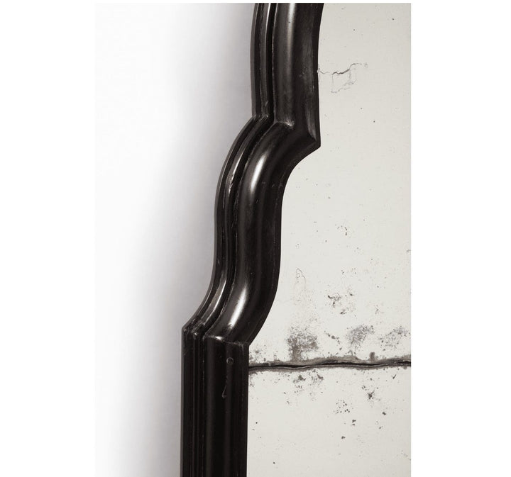 Pair of Queen Anne Style Ebony Pier Mirrors with aged mirror plates and elegant early 18th-century solid ebony frames.
