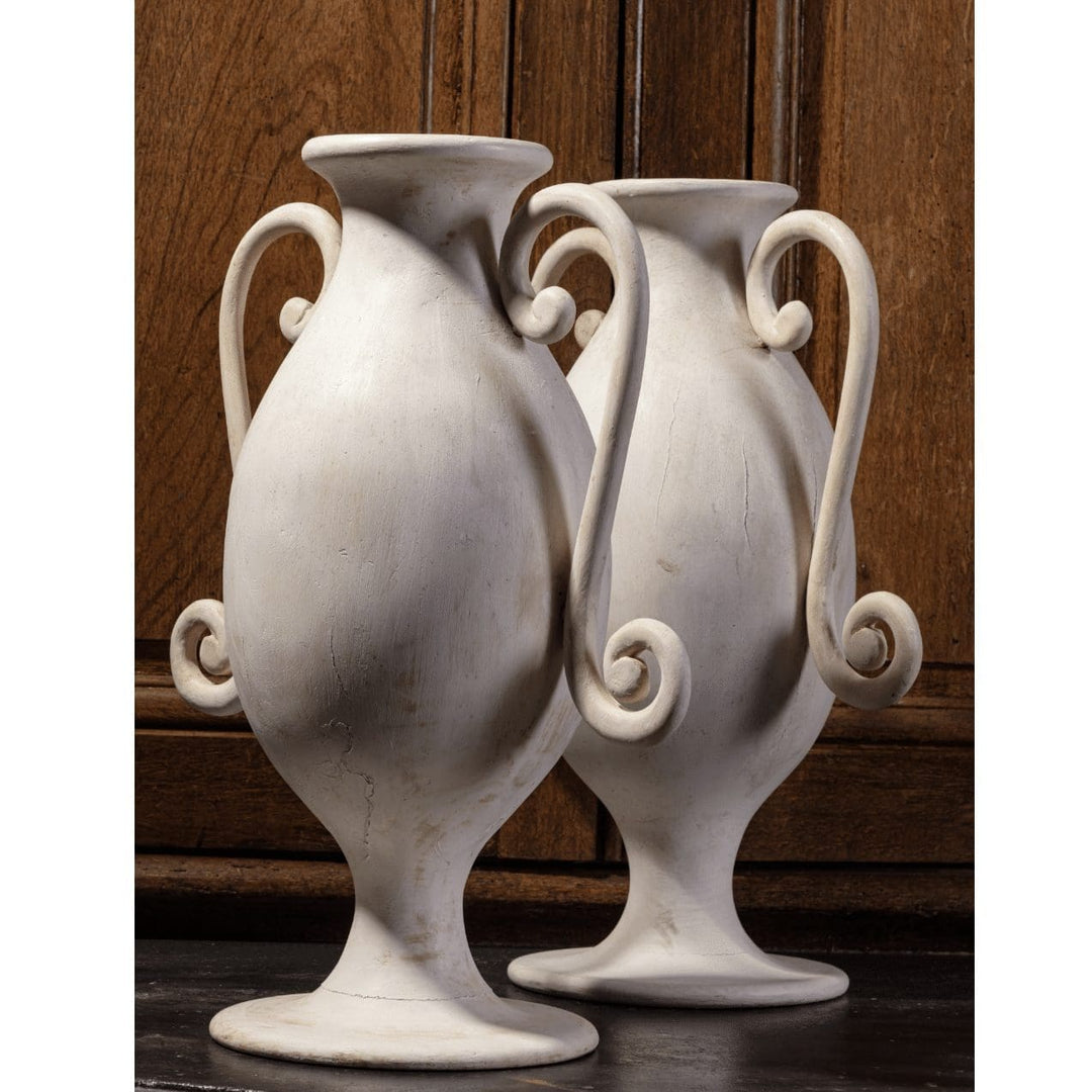 A pair of painted wood lamp bases designed by Andrew Allfree with elegant curved handles and bespoke undercoat finish.