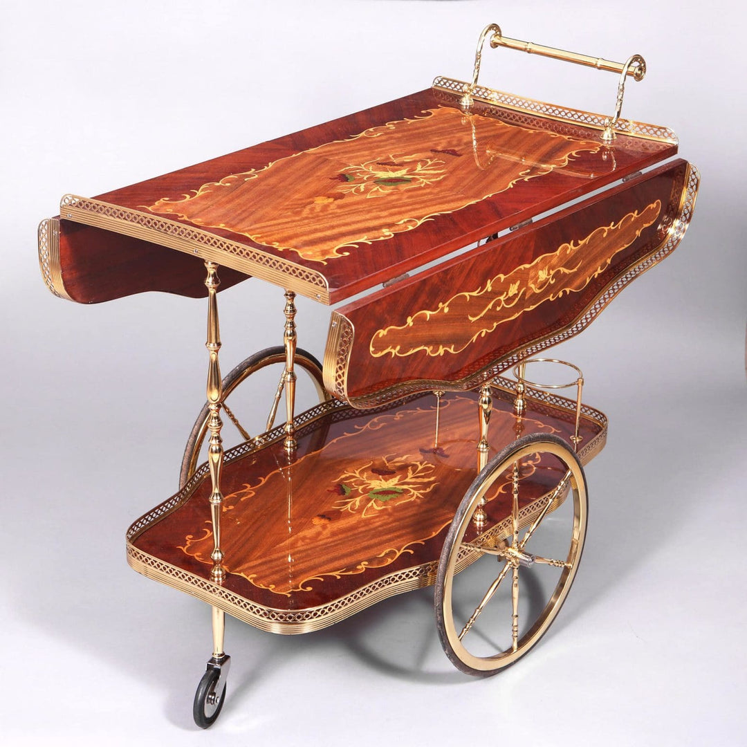 MID CENTURY ITALIAN MARQUETRY DRINKS TROLLEY with brass legs, inlaid marquetry trays, drop leaves, and large wheels circa 1960.