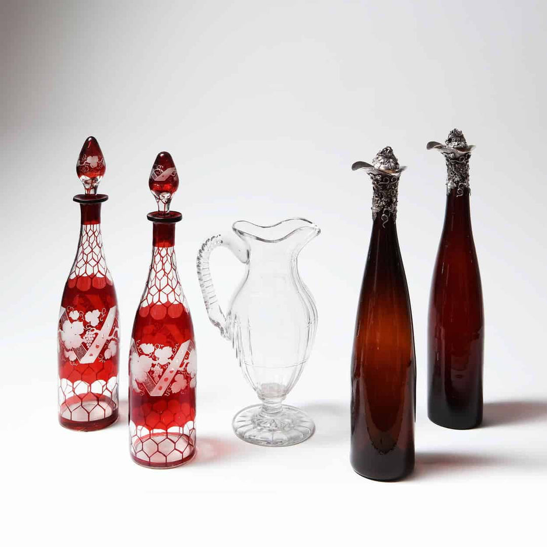 A Pair Of Silver Mounted 19Th C Bottles