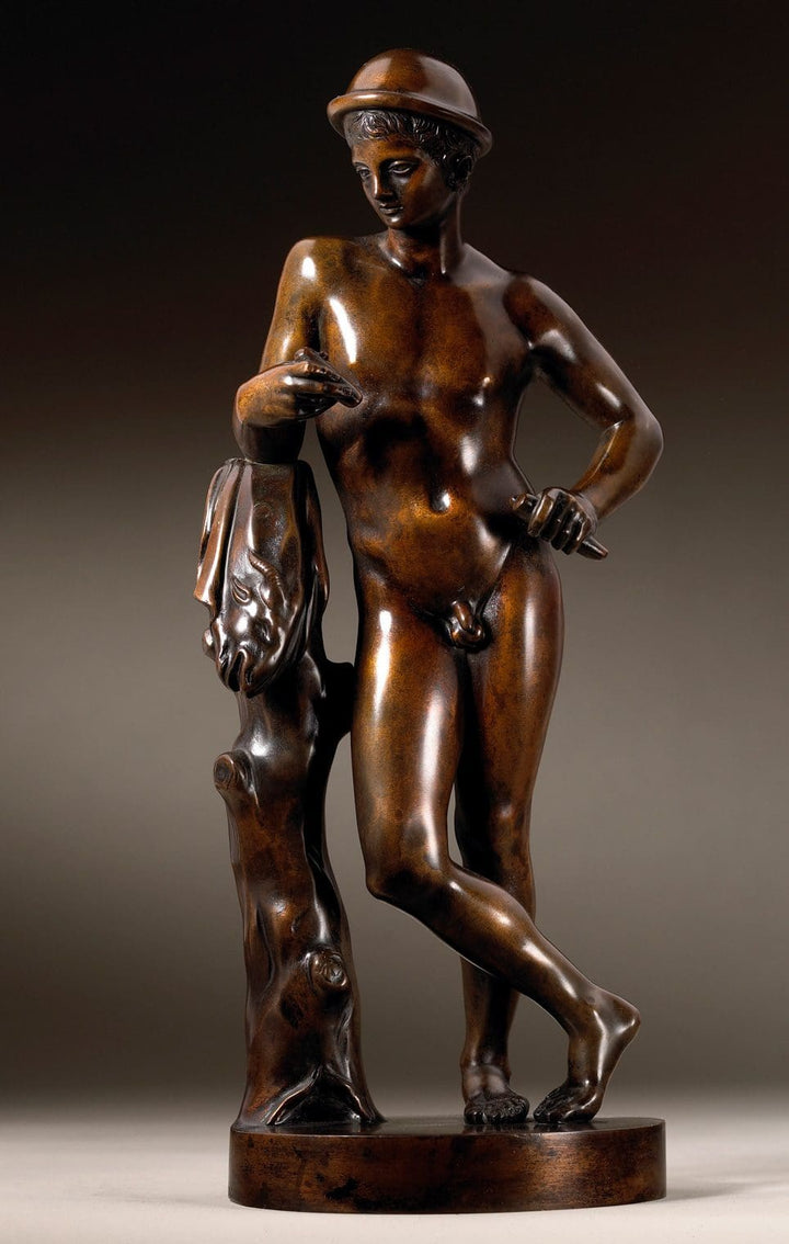 Massimiliano Soldani Benzi bronze sculpture of a nude male figure leaning on a tree stump with a hat.