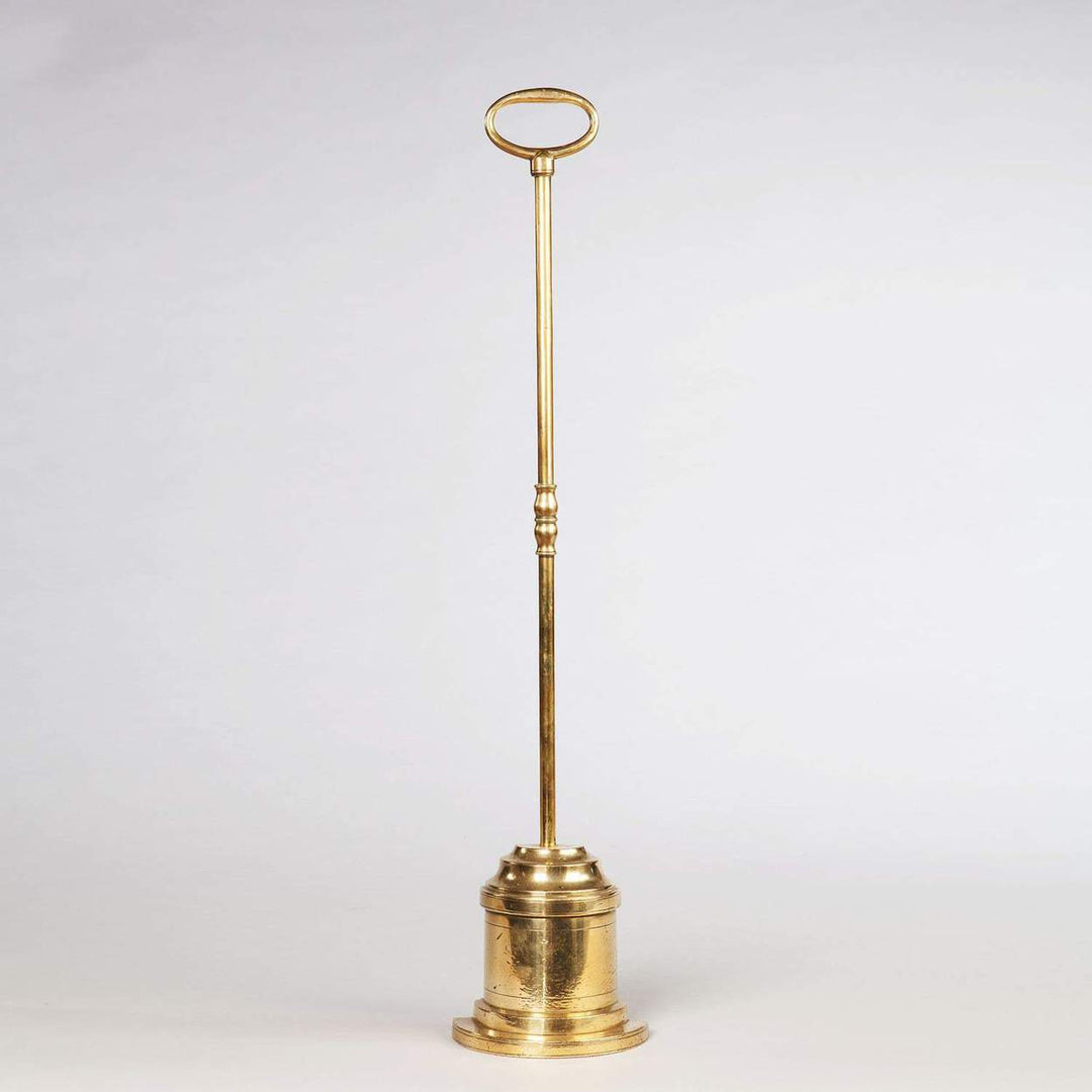 An Overscale Tall Regency Brass Door Stop