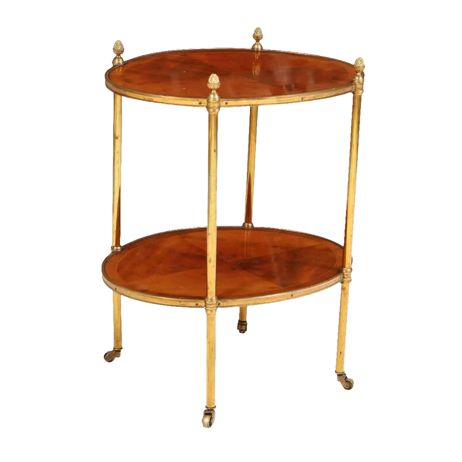 Quarter Veneered Bookmatched Mahogany Oval 2 Tier Table with brass frame and casters, England circa 1910.