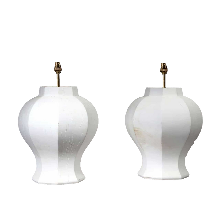 A Pair of Faceted Octagonal Wooden Lamps with white finish and brass fittings, France circa 2000, 37 cm diameter, 43 cm height.