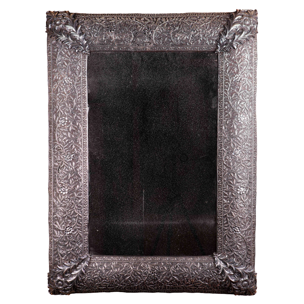 19th Century North Indian Mughal Kutch Repoussé Silver Mirror with intricate solid silver repoussé scroll and acanthus leaf frame.