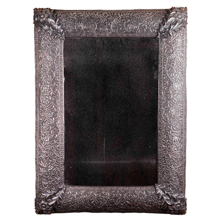 19th Century North Indian Mughal Kutch Repoussé Silver Mirror with intricate solid silver repoussé scroll and acanthus leaf frame.