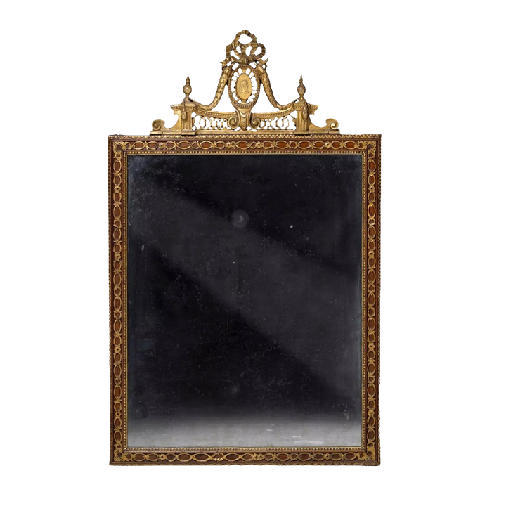 Neo Classical late 18th Century Parcel-gilt Pier Mirror with gilt strapwork and Roman Emperor medallion circa 1800.