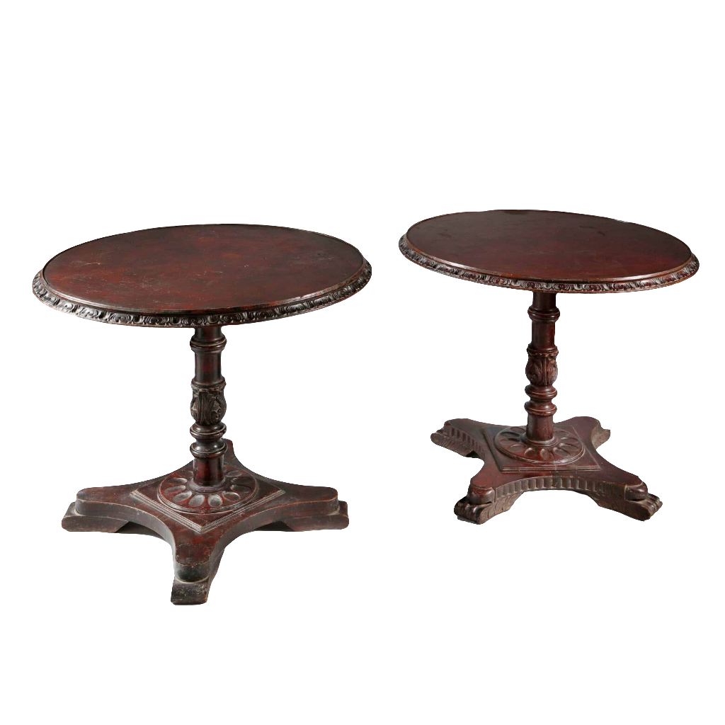 Matched Pair of Indian Circular End Tables with circular tops and carved column bases on scroll feet, circa 1900.