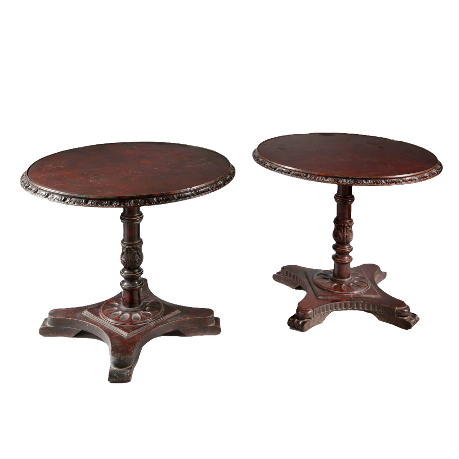 Matched Pair of Indian Circular End Tables with circular tops and carved column bases on scroll feet, circa 1900.