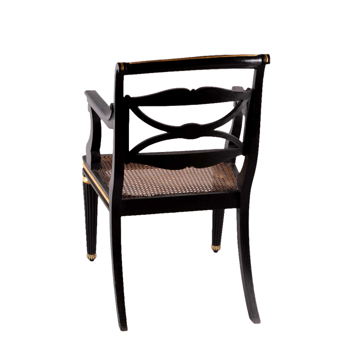 A pair of Regency parcel gilt armchairs