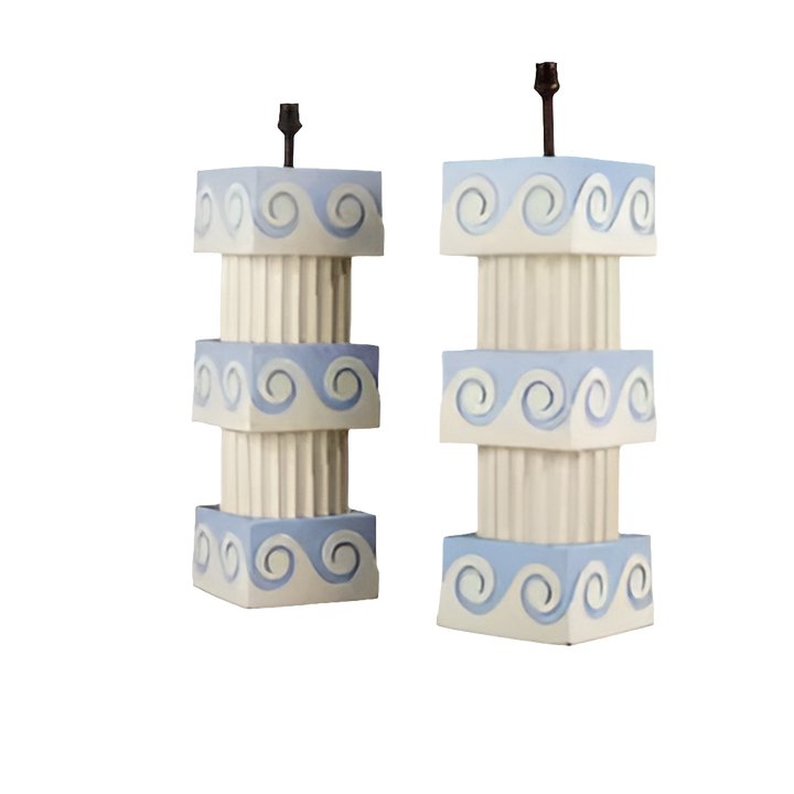A Pair of Vitruvian Scroll Column Lamps with fluted wooden columns and blue scroll ornament cubes.