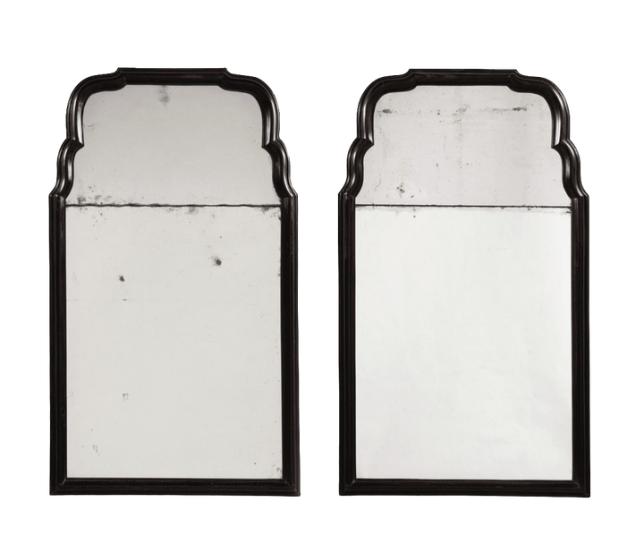 Pair of Queen Anne Style Ebony Pier Mirrors with aged mirror plates, solid ebony frames, early 18th-century design.