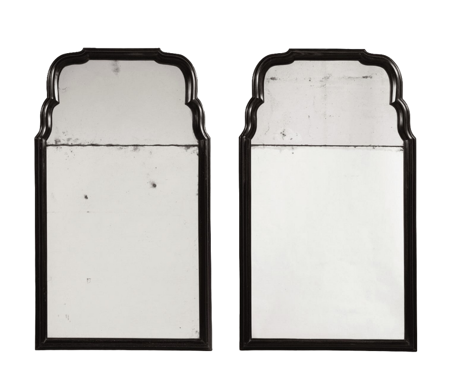 Pair of Queen Anne Style Ebony Pier Mirrors with aged mirror plates, solid ebony frames, early 18th-century design.