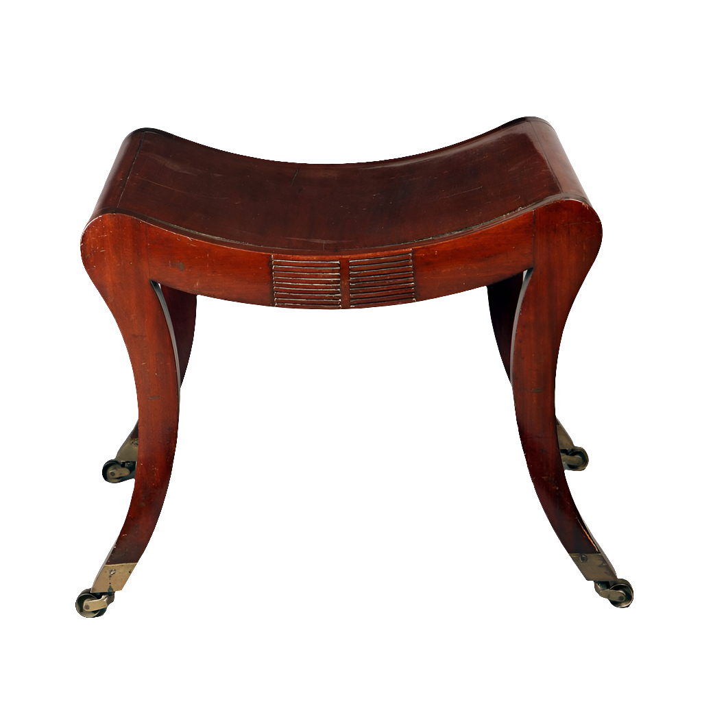A Regency mahogany sabre legged saddle stool