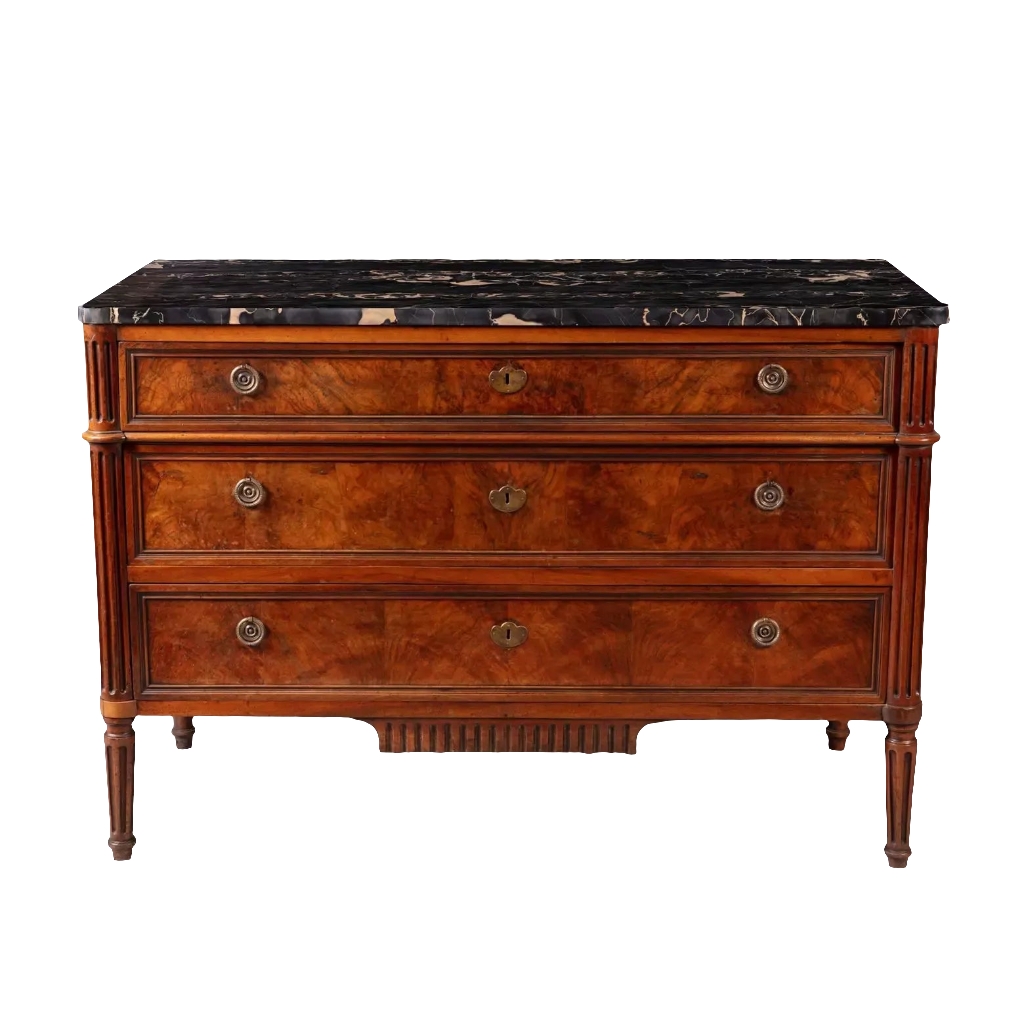A French provincial Louis XVI commode with burr walnut veneer, fluted legs, and Nero Portoro marble top, stamped COURTE.
