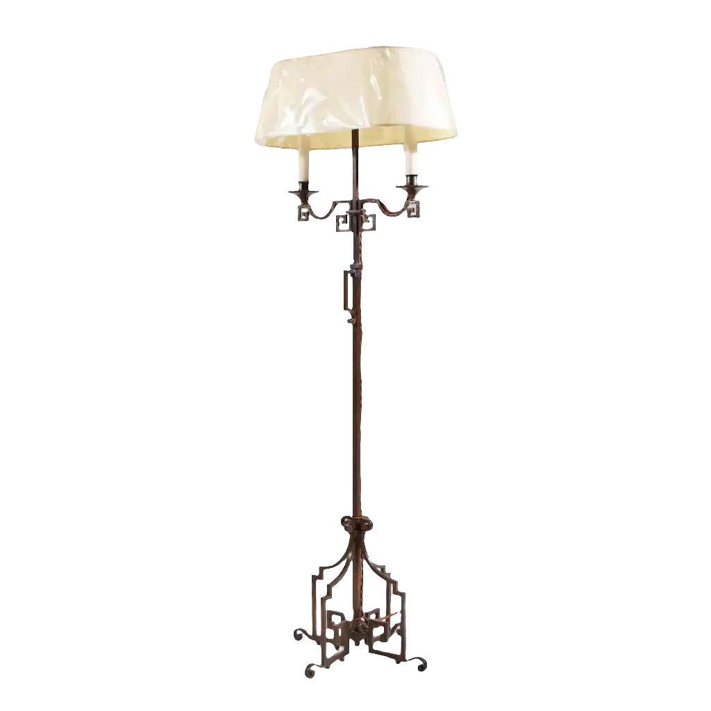 A patinated Steel floor standing bouillotte lamp