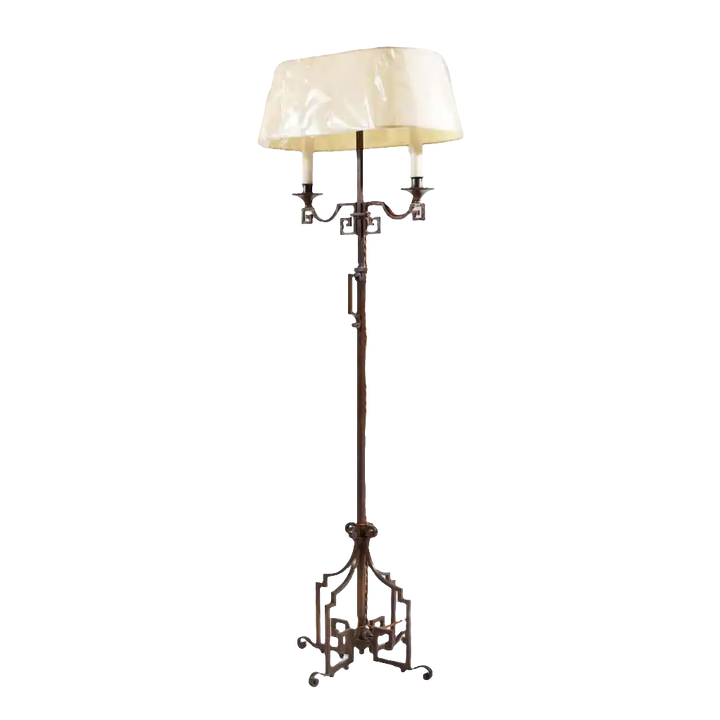 A patinated Steel floor standing bouillotte lamp
