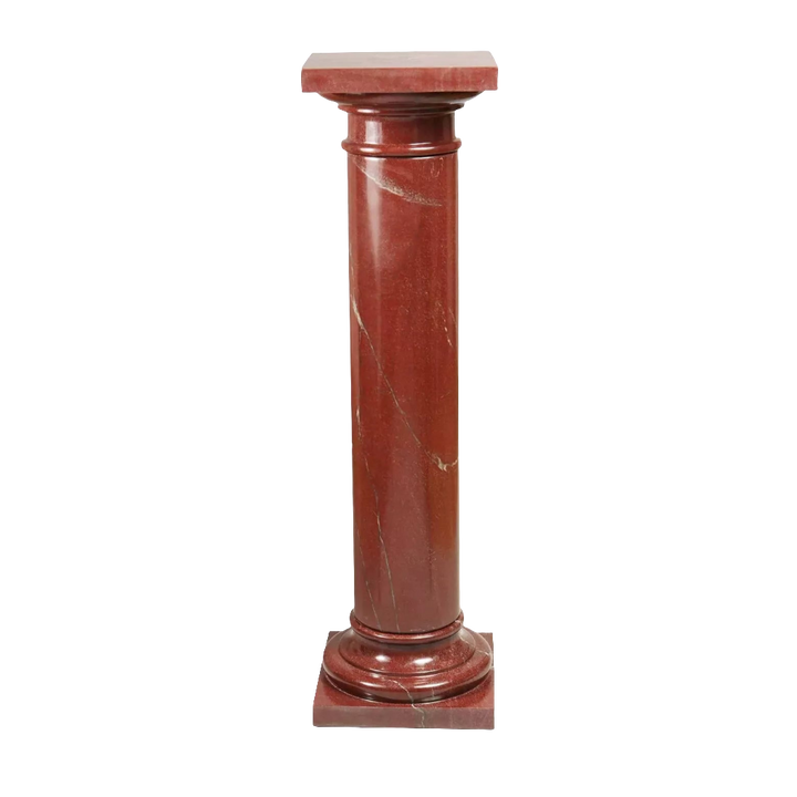 Rosso Marble Pedestal is a polished red marble column with turned base and rotating capital, Italy circa 1900.