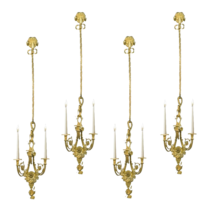 SET OF FOUR FRENCH NEOCLASSICAL GILT BRONZE WALL LIGHTS