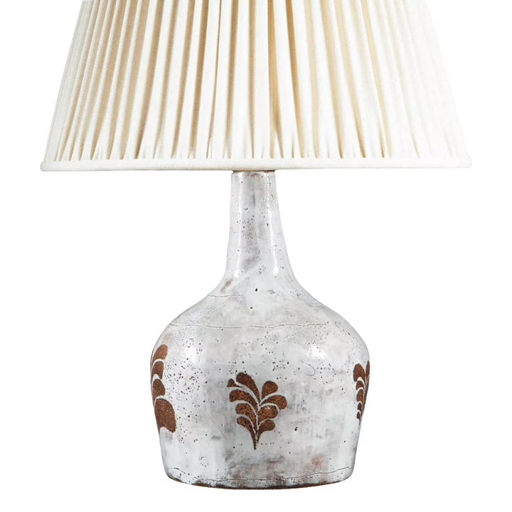 French Mid-Century Glazed Ceramic Table Lamp with white glaze and biscuit leaf motifs, 32 cm high, shade not included.