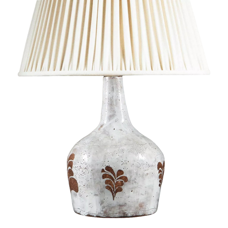 French Mid-Century Glazed Ceramic Table Lamp with white glaze and biscuit leaf motifs, 32 cm high, shade not included.