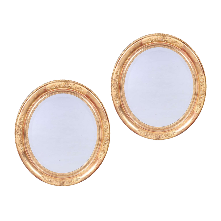 Pair of Victorian Giltwood Oval Wall Mirrors with beveled mercury plates, 19th-century English antique design.