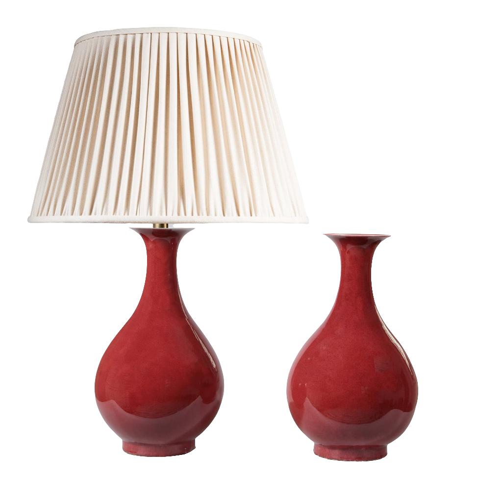 Pair of Meiping Sang de Boeuf Table Lamps with deep red glaze porcelain vases, one with cream pleated lampshade.