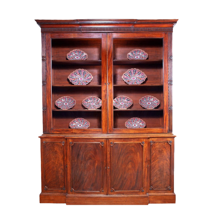 George III Chippendale period mahogany breakfront bookcase with glazed doors and carved detailing circa 1780.