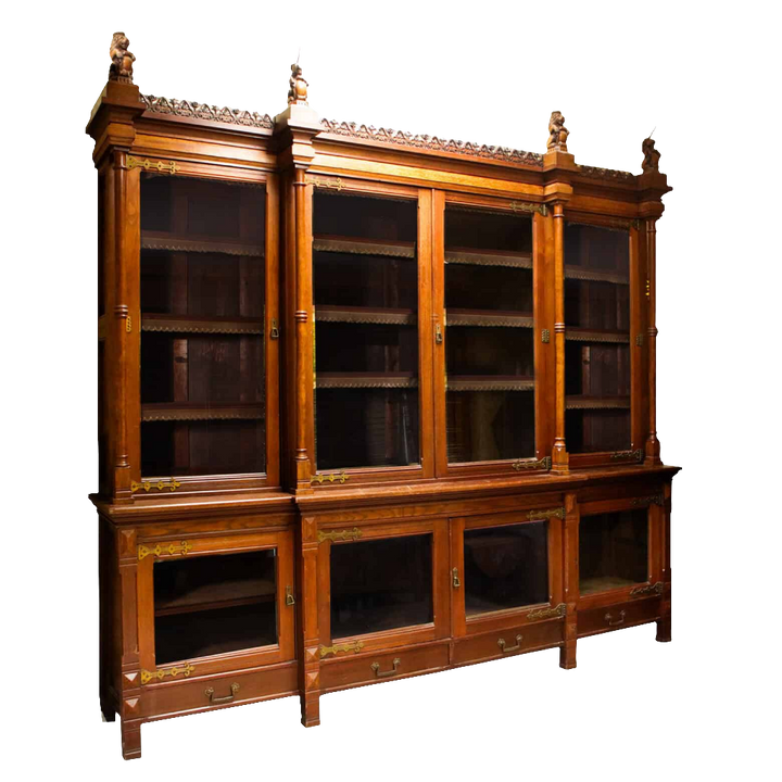 Aesthetic Movement Breakfront Bookcase oak with glazed doors and decorative lions and unicorns cornice circa 1880 England