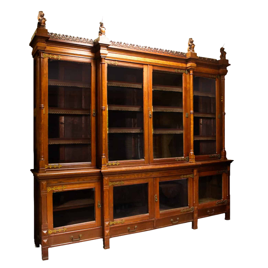 Aesthetic Movement Breakfront Bookcase oak with glazed doors and decorative lions and unicorns cornice circa 1880 England