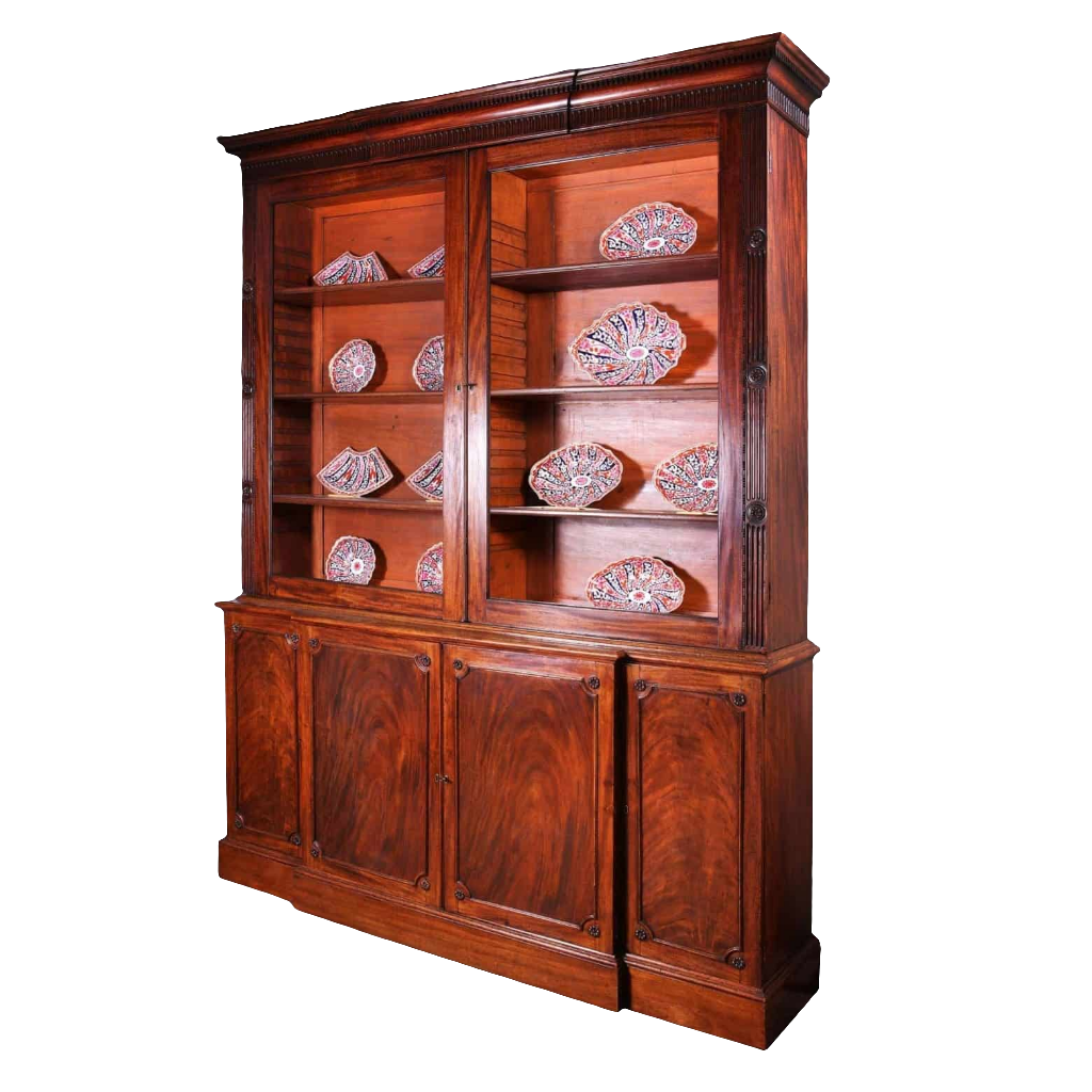 George III Chippendale period mahogany breakfront bookcase with glazed doors and carved details circa 1780 England