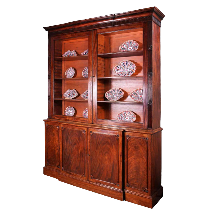 George III Chippendale period mahogany breakfront bookcase with glazed doors and carved details circa 1780 England