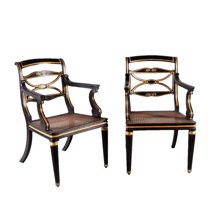 A pair of Regency parcel gilt armchairs