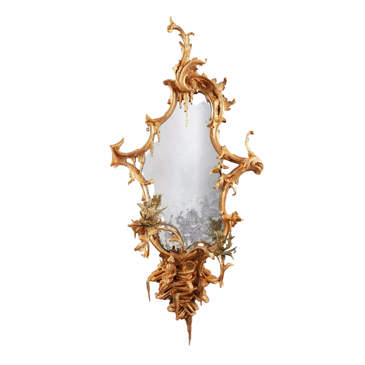 George III Chinese Chippendale Rococo Giltwood Girandole Mirror with ornate scrolls and candle arms, circa 1765.