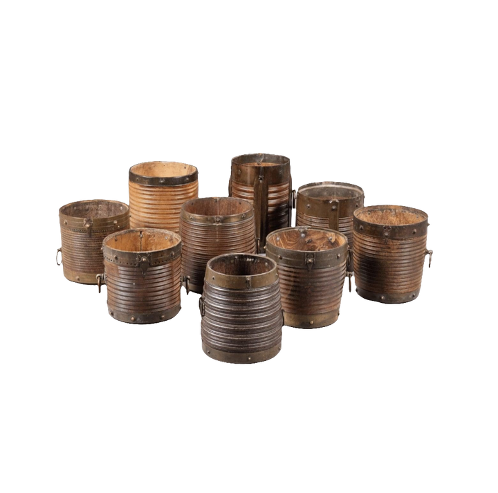 Collection of 9 brass bound rice measures
