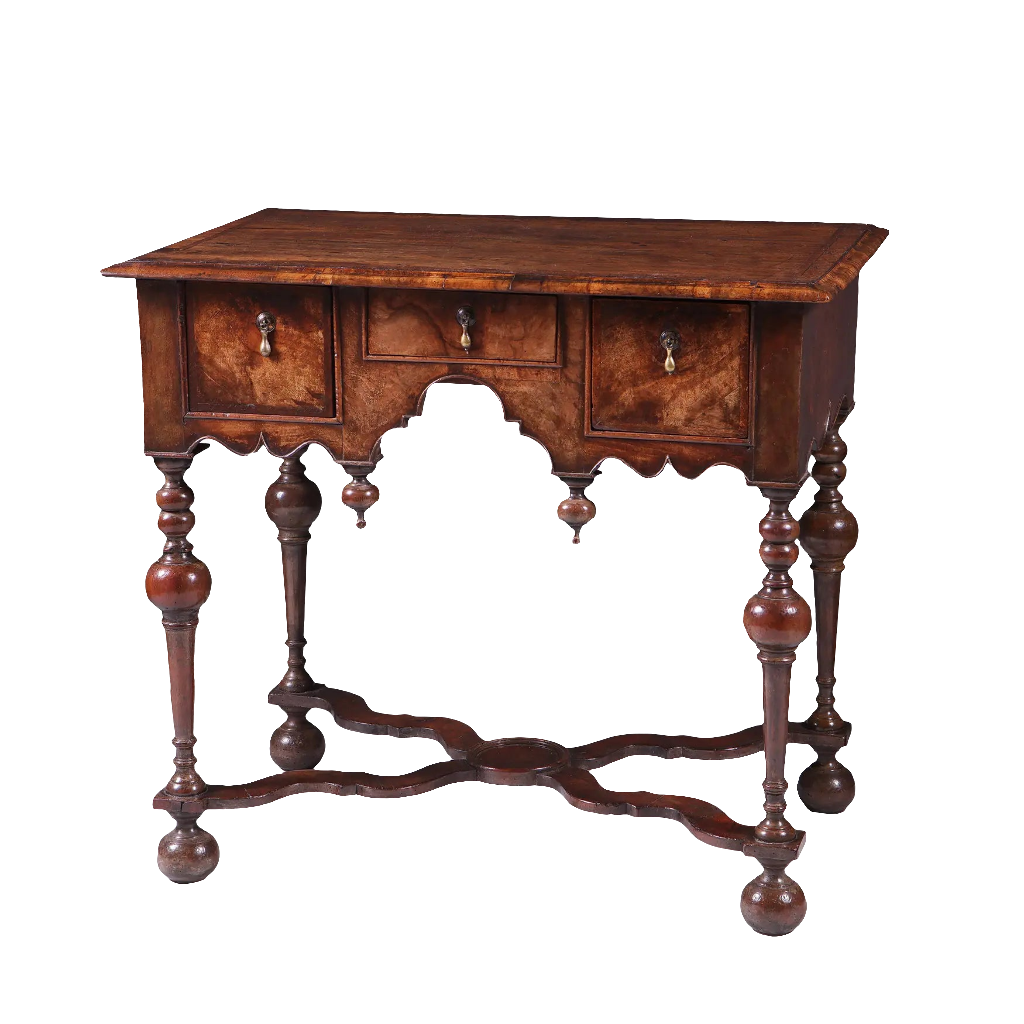 GEORGE I WALNUT LOW BOY with three drawers, Dutch gable aprons, lathe turned legs, and bun feet, early 18th century style.