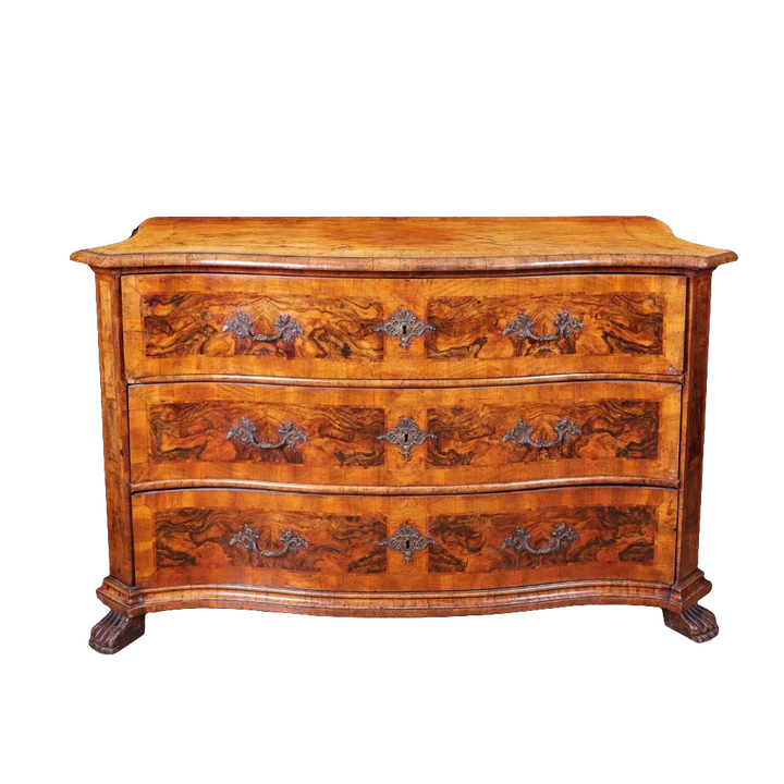Early 18th Century Italian Walnut Commode with three drawers and ornate rococo handles on carved paw feet.