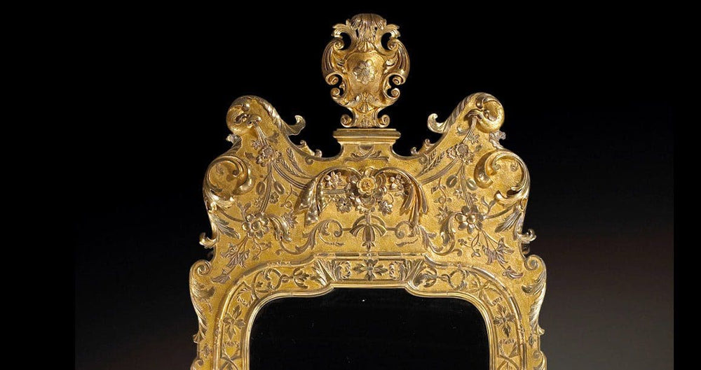George I Gesso Pier Mirror with ornate gilt gesso frame, carved strapwork, floral details, and split beveled mirror plates.