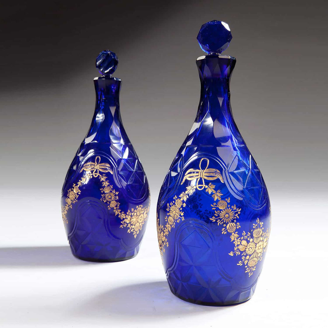 Pair Of Blue Glass Facet Cut Decanters