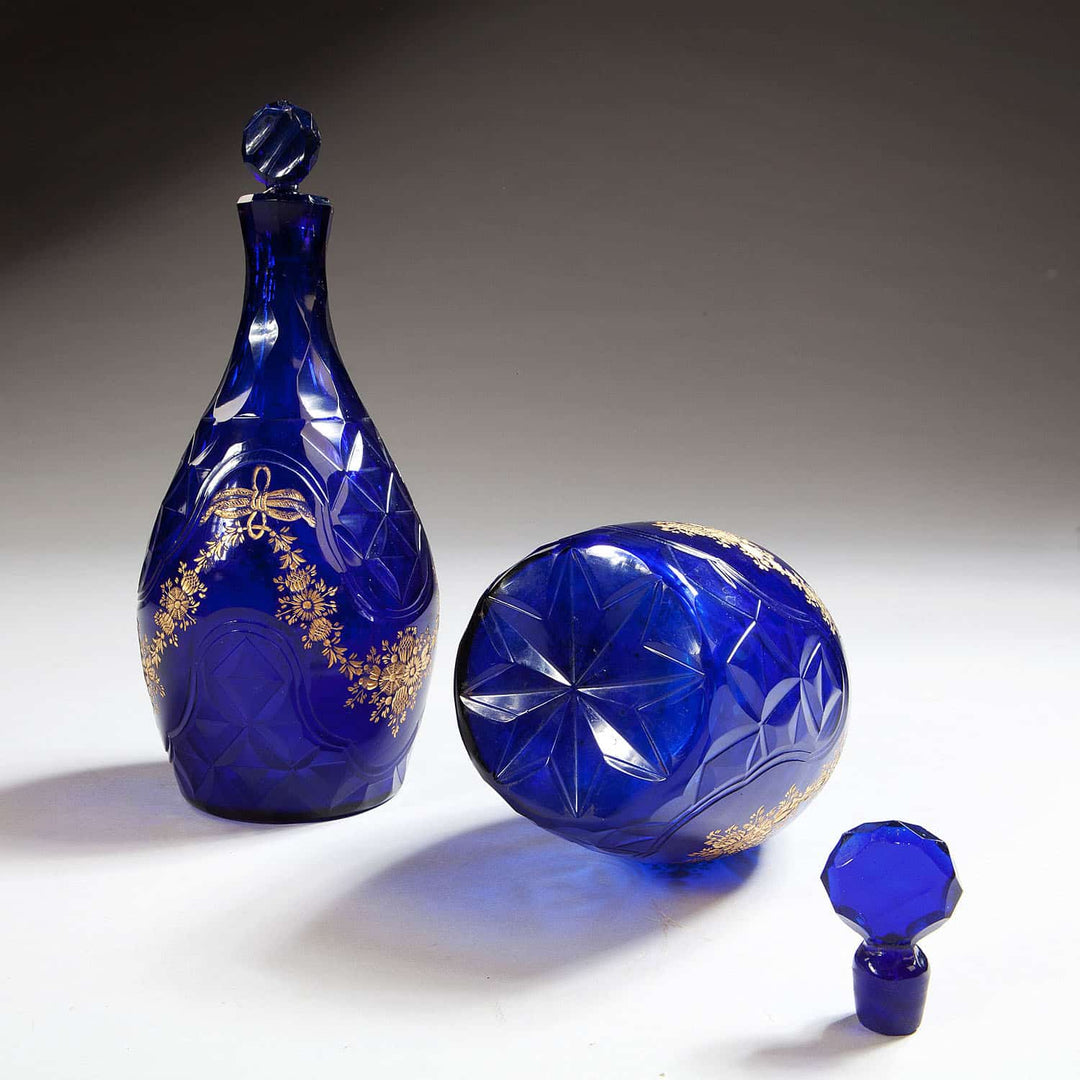 Pair Of Blue Glass Facet Cut Decanters