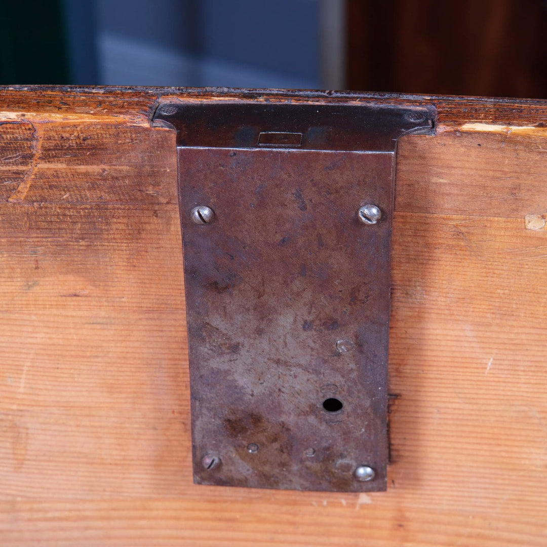 Early 18th Century Italian Walnut Commode showing detailed iron lock plate inside wooden drawer.