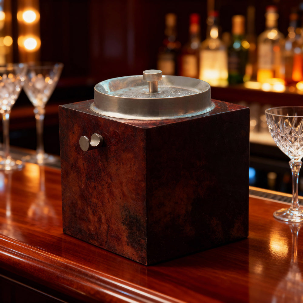 Mid Century Maroon Parchment and Chrome Ice Bucket by Aldo Tura displayed on bar by Nicholas Wells Antiques