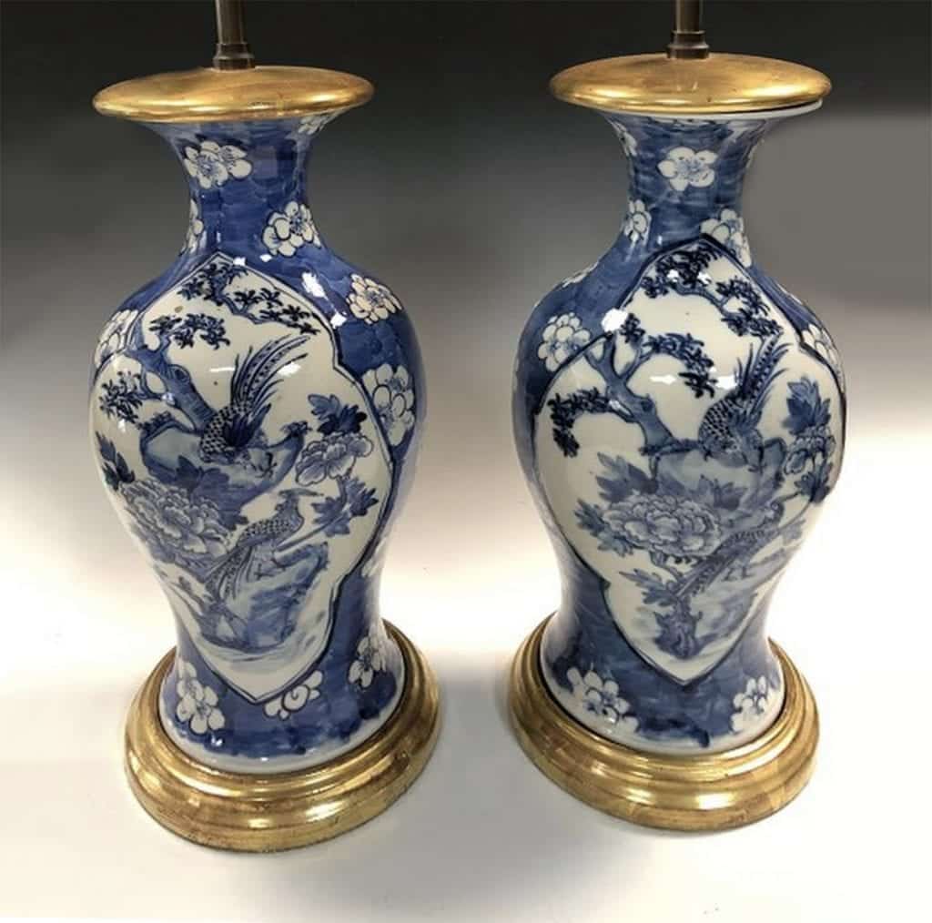 PAIR OF CHINESE BLUE AND WHITE TABLE LAMPS WITH WATER GILT BASES