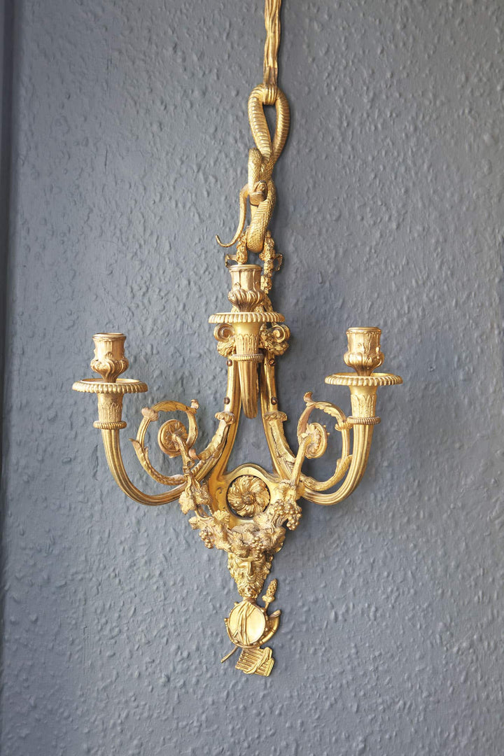 SET OF FOUR FRENCH NEOCLASSICAL GILT BRONZE WALL LIGHTS