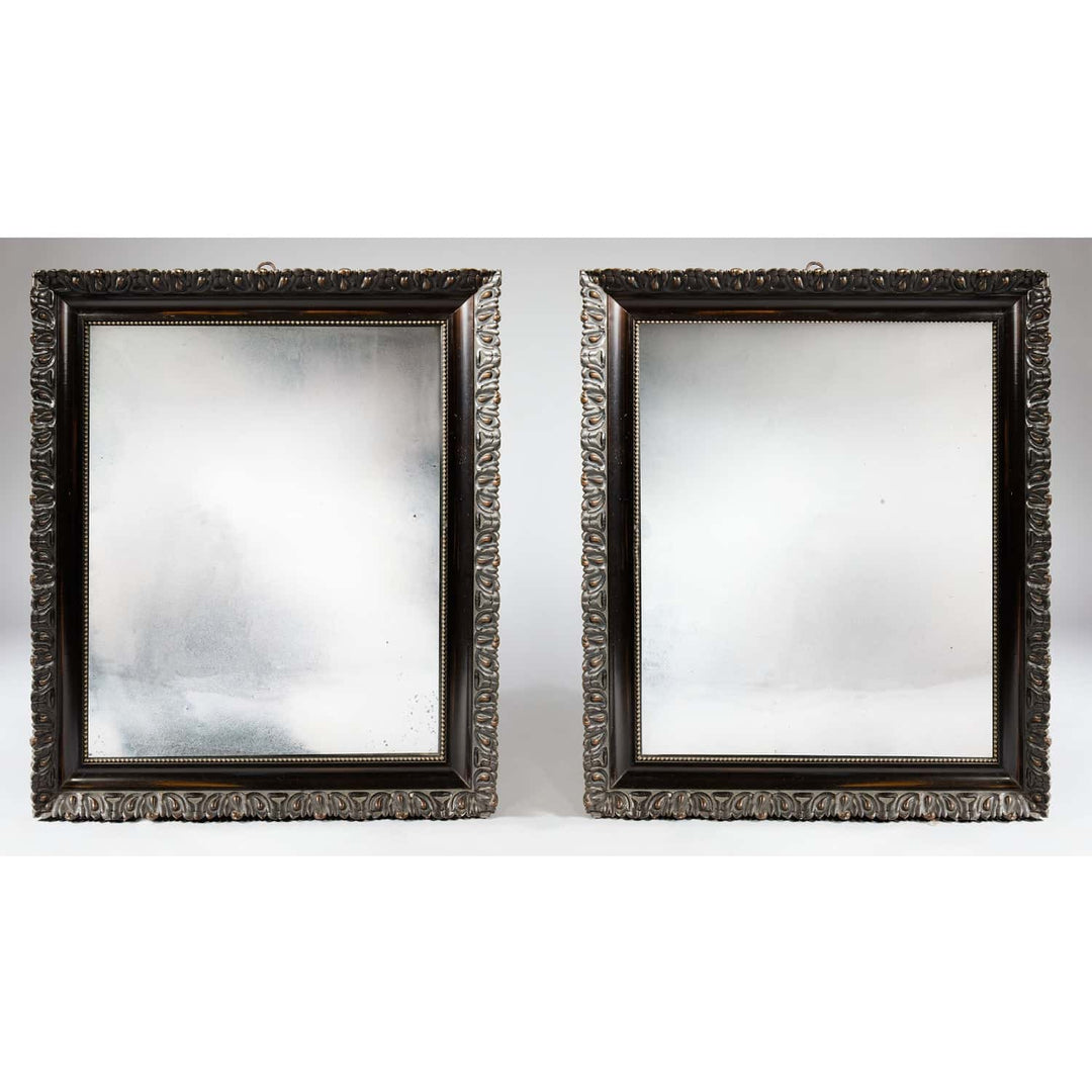 Pair Of 19th Century French Mirrors with polished detailed frames and original aged mirror plates, circa 1870, France.